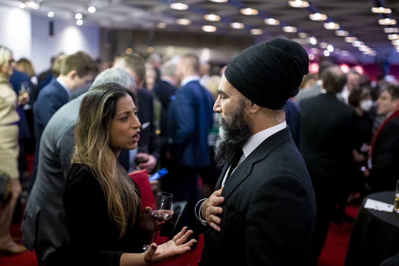 Jagmeet Singh (right) chats with a guest at the gala