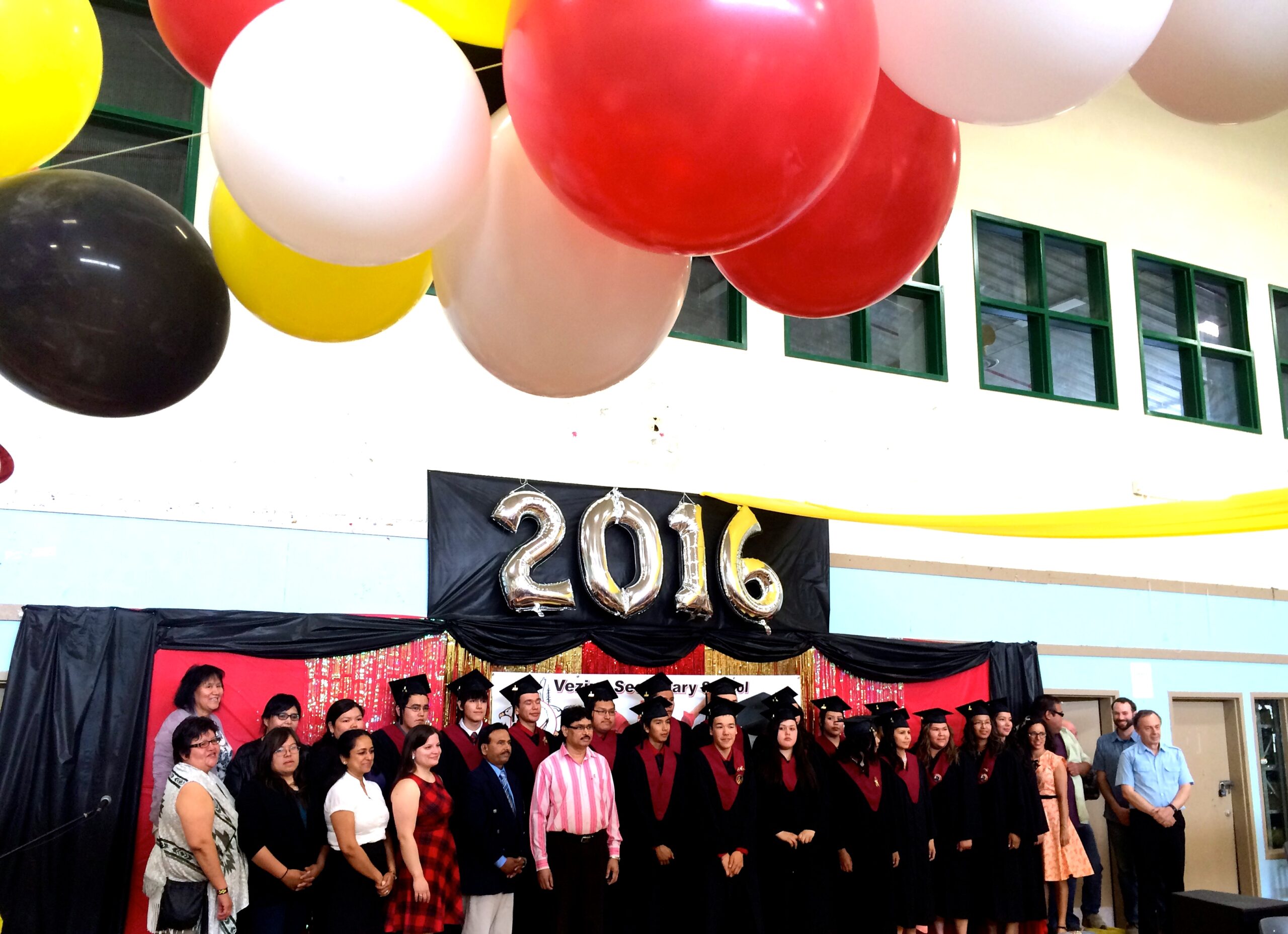 Proud teachers, students and staff from Vezina Secondary School stand tall during the graduation ceremony.