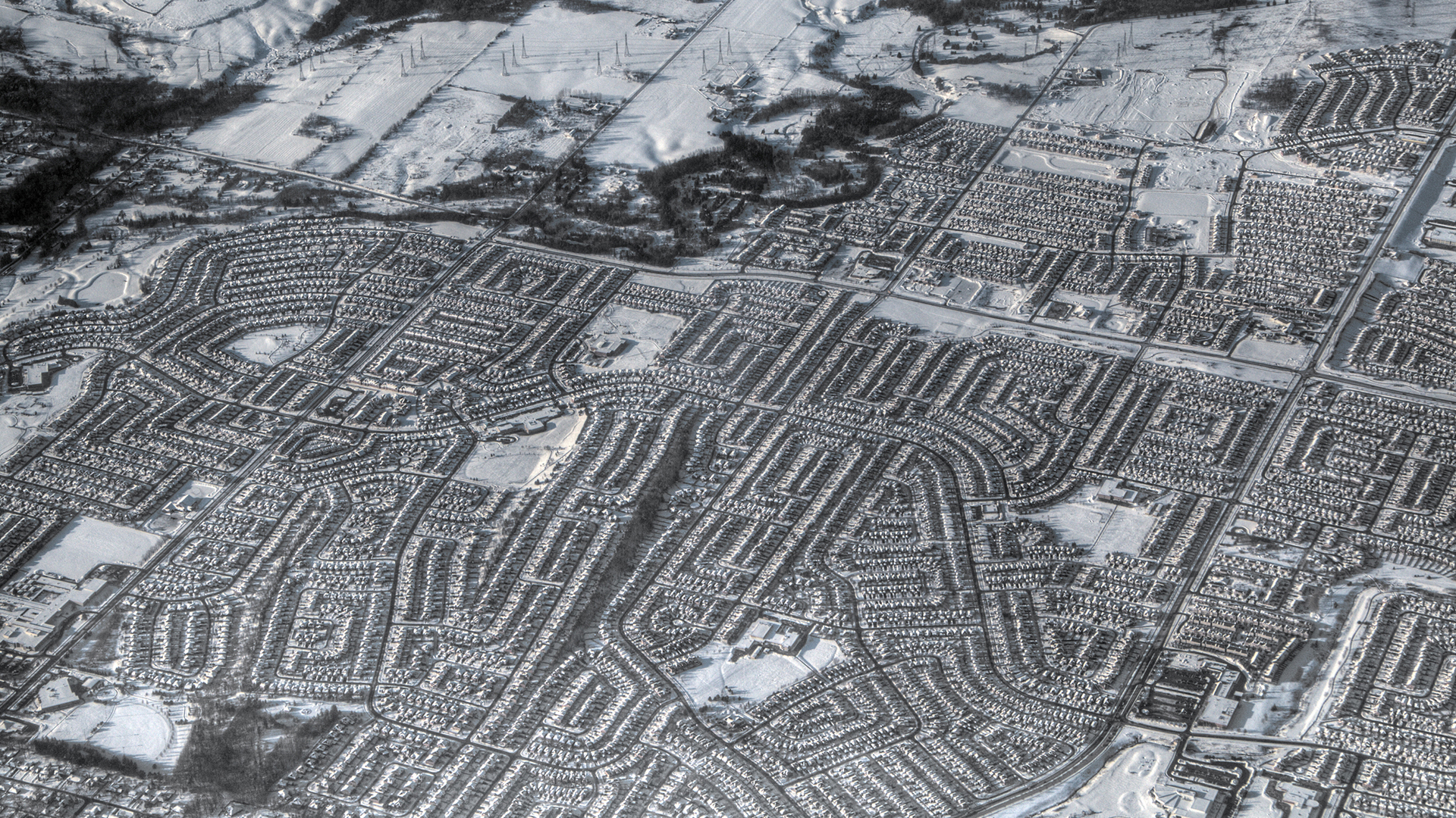 Distant aerial shot of a Toronto suburb in winter.