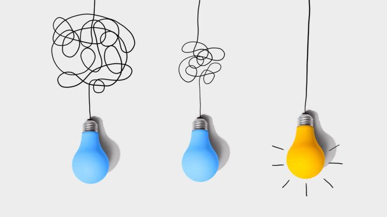 Three lightbulbs hang from drawn black lines. The first line is tangled up hopelessly. The second one is minimally tangled. The third is untangled.