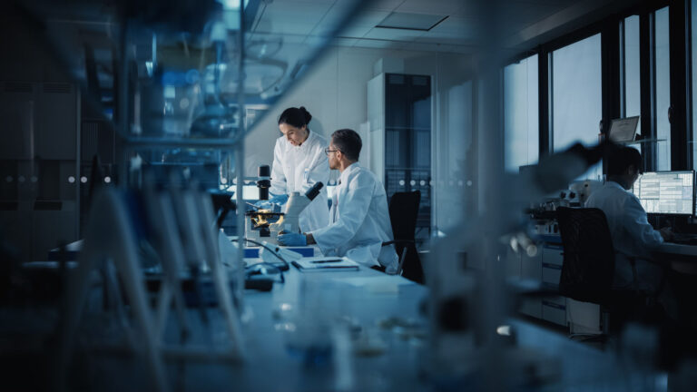 Scientists work in a laboratory.