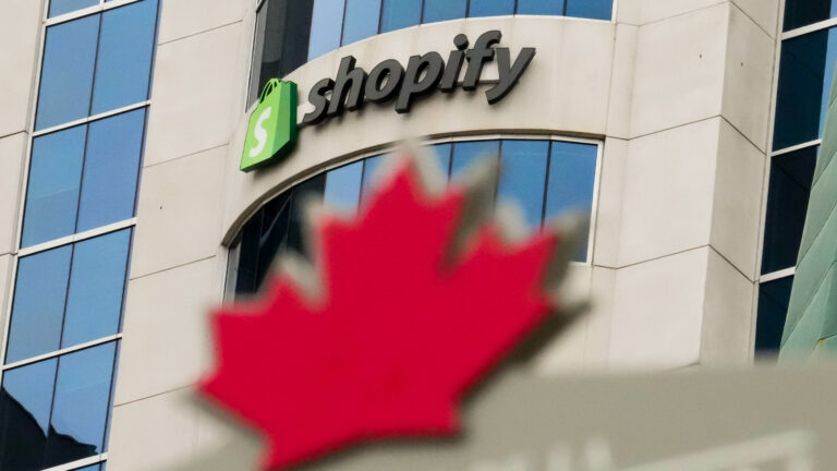 Maple Leaf in foreground, Shopify building in background.