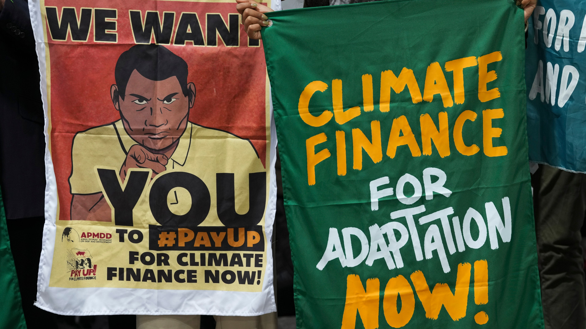 Des militants participent à une manifestation pour le financement lors du sommet climatique de l'ONU COP29, jeudi 14 novembre 2024, à Bakou, en Azerbaïdjan. (AP Photo/Peter Dejong)