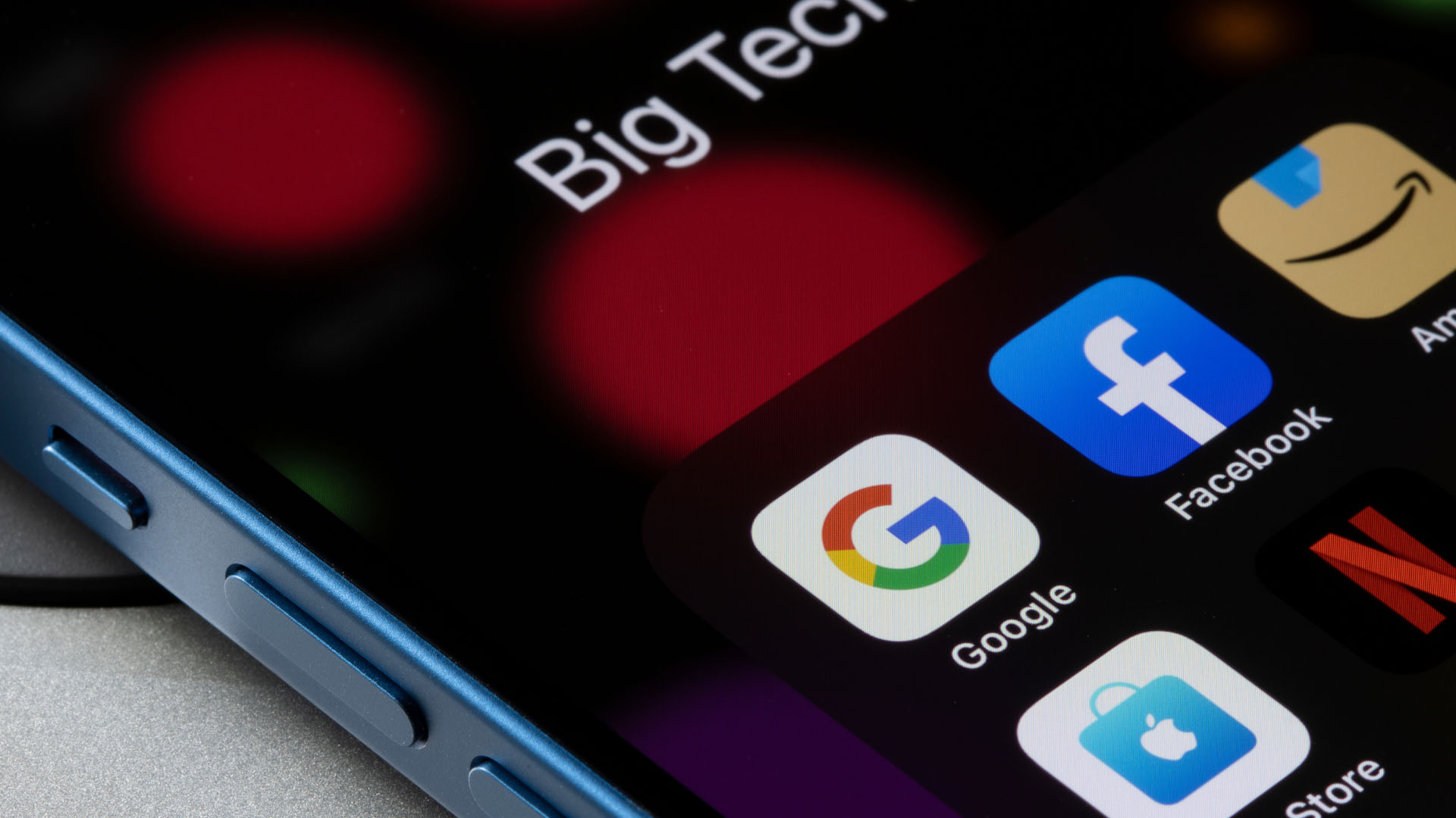 A mobile phone is shown with the icons of Google, Facebook, Amazon and the Apple store.