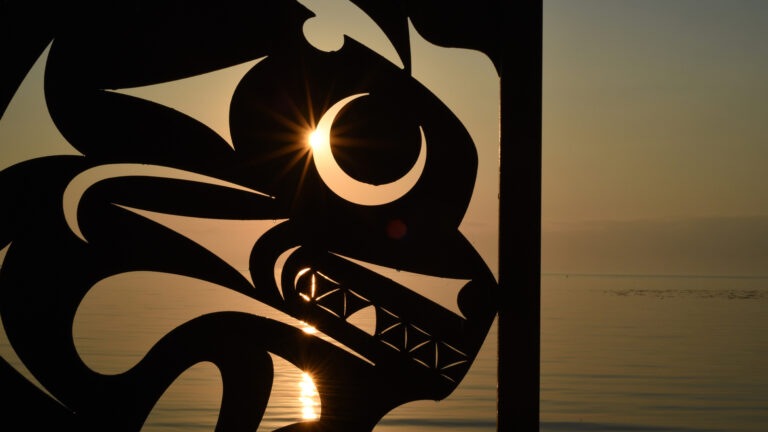An Indigenous public art sculpture by Chris Paul titled Salish Sea is silhouetted at sunrise along the Oak Bay Marina walkway in the greater Victoria municipality of Oak Bay, British Columbia on Vancouver Island on October 17, 2022. THE CANADIAN PRESS IMAGES/Don Denton