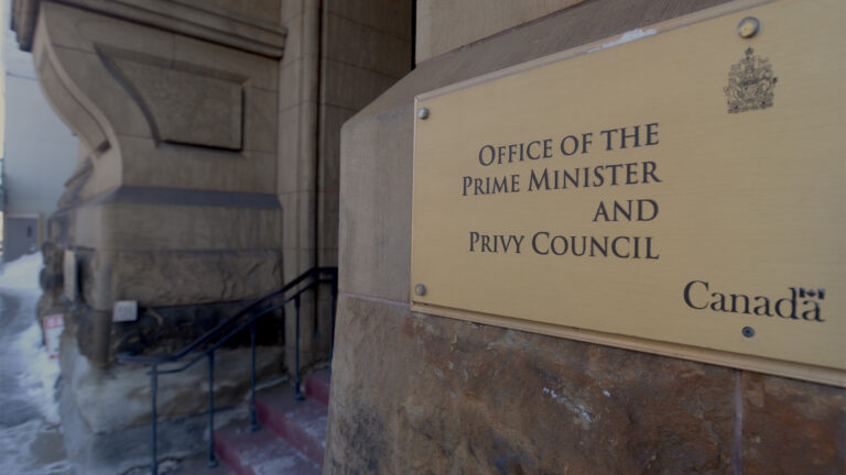 A photo of the sign at the entrance of Office of the Prime Minister and Privy Council.