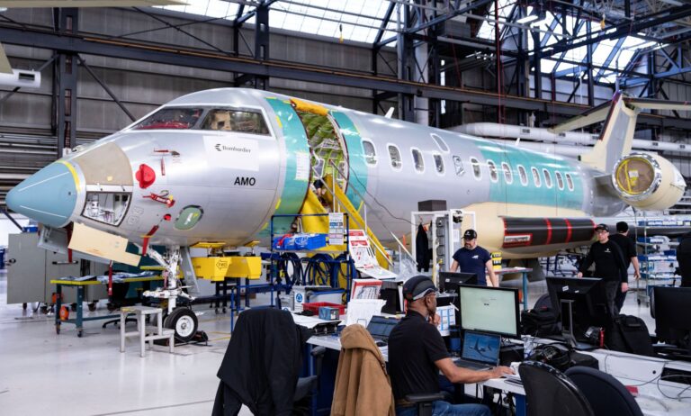 A two-engine jet aircraft in production.