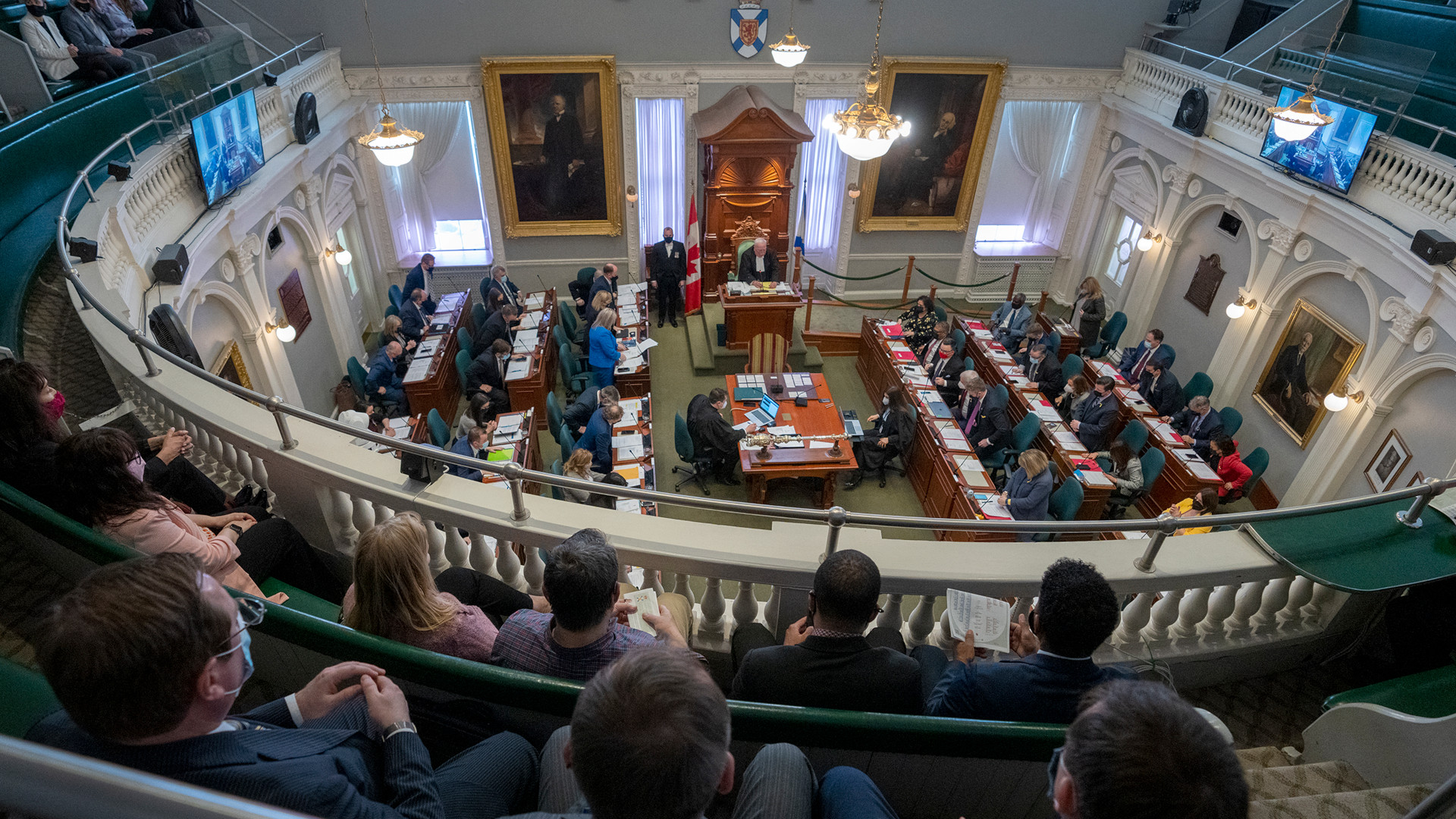 A view of a sitting of the legislature from the public gallery.