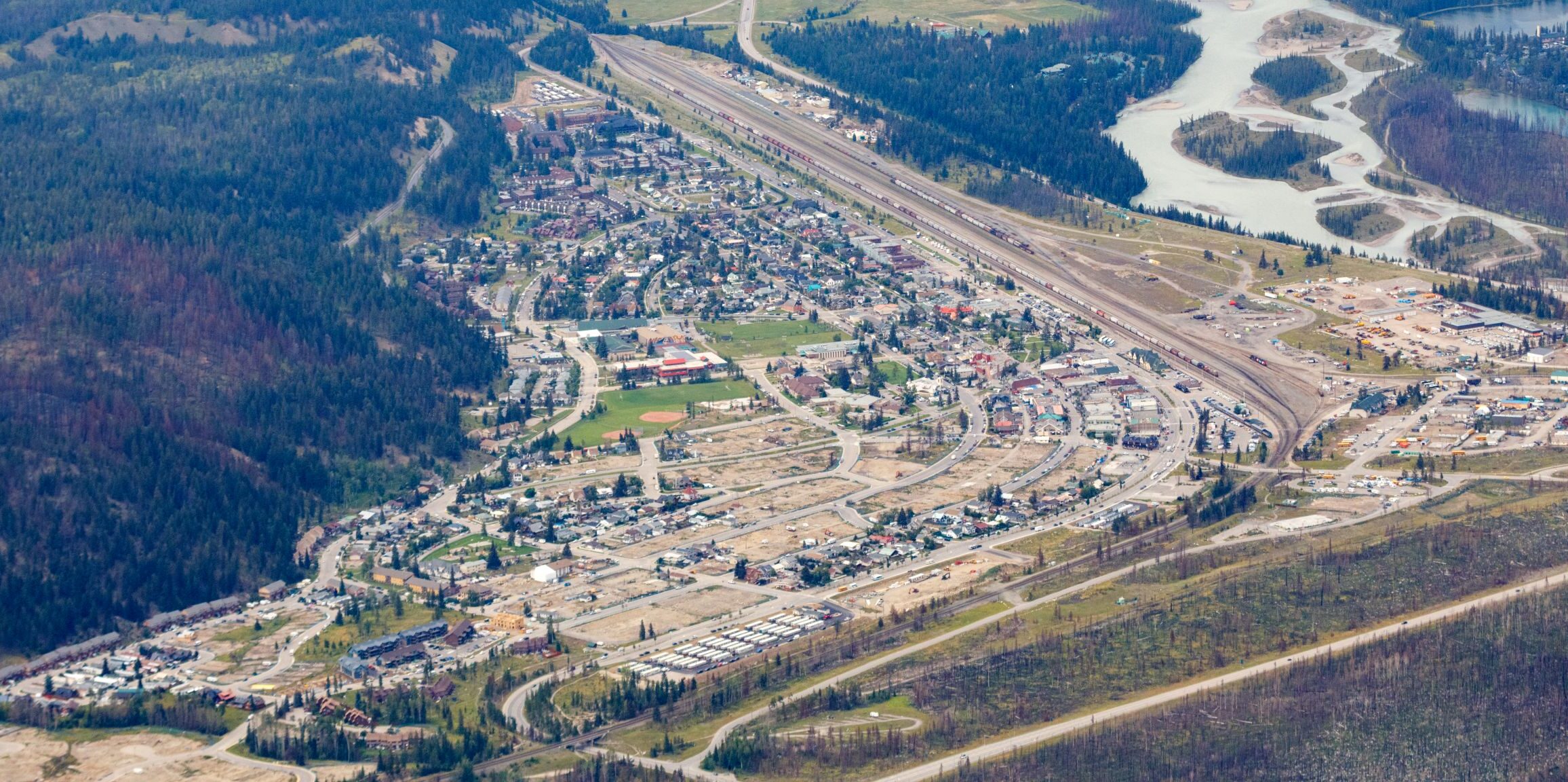 An aerial view of Jasper, with several sections of the town now gravel pads.