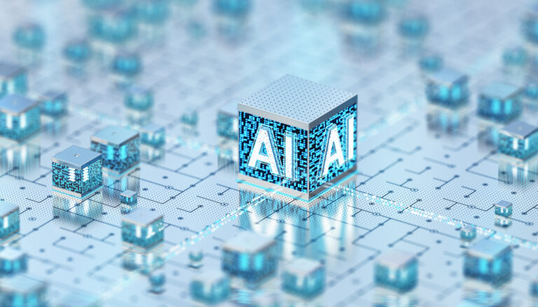 A computer motherboard is covered in cubes. At the centre is the biggest cube, which says AI on both side.