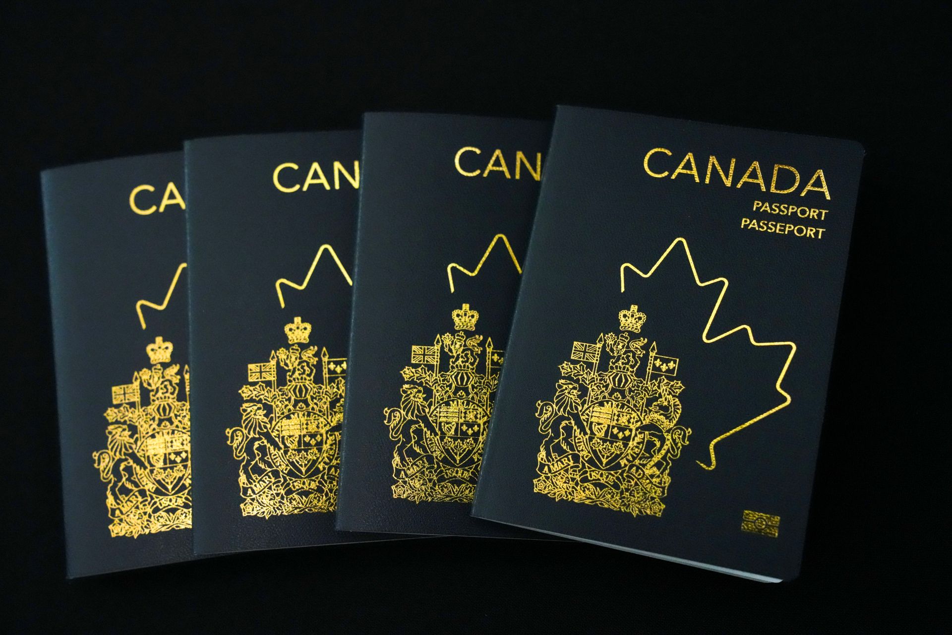 Four Canadian passports