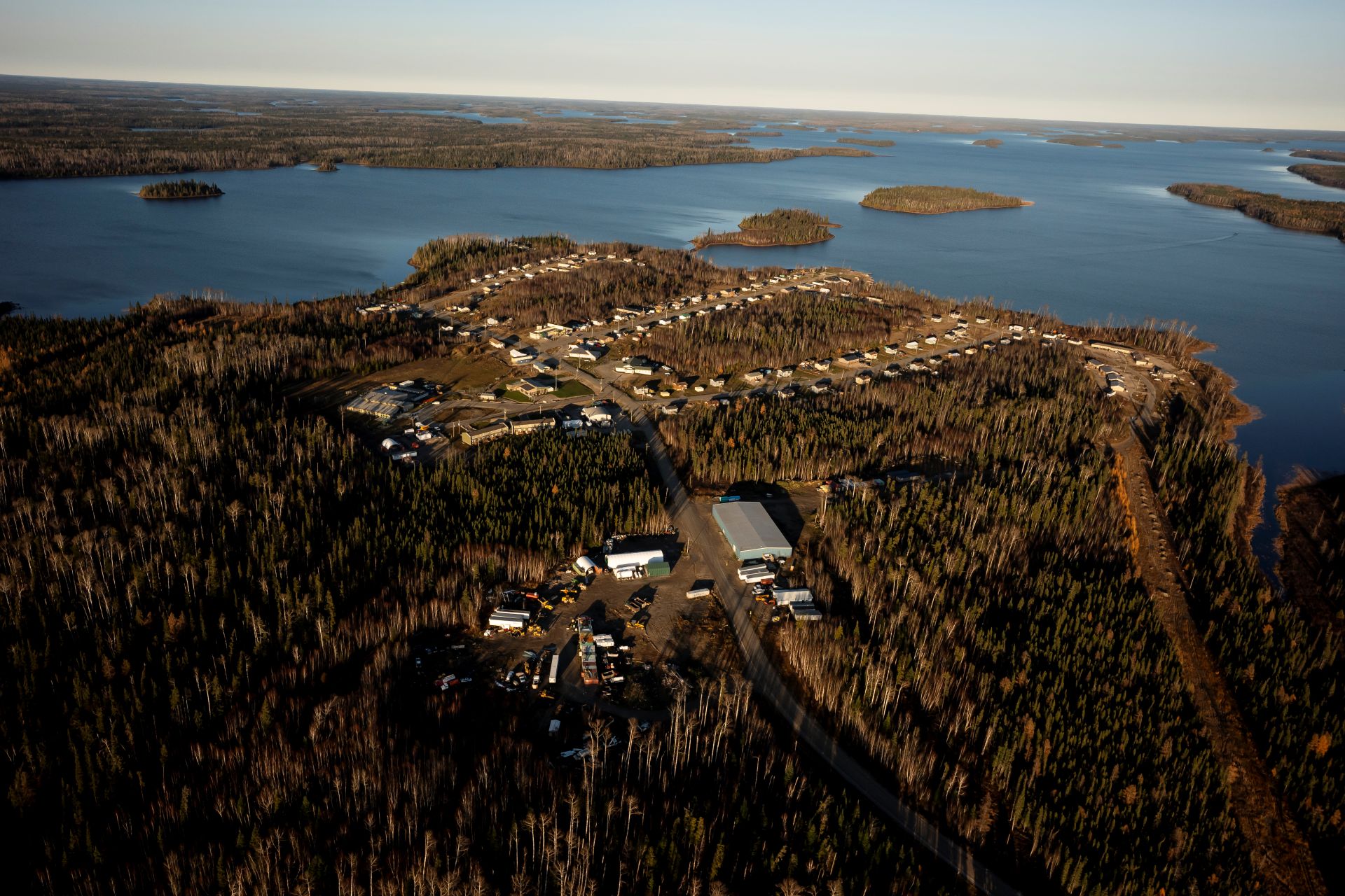 Aerial view of a waterside rural First Nations community.
