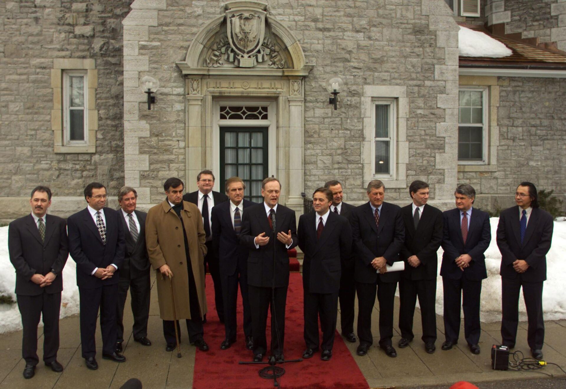 The first ministers standing in front of the prime minister’s residence, from left to right: Glen Clark, B.C.; Gary Filmon, Man.; Ralph Klein Alta.; Lucien Bouchard, Que.; Piers McDonald, Yukon; Roy Ramanow, Sask.; Jean Chrétien, Brian Tobin, Nfld.; Camille Thériault,N.B.; Miike Harris, Ont.; Patrick Binns, P.E.I.; Russell MacLellan, N.S.; and Jim Antoine, N.W.T.
