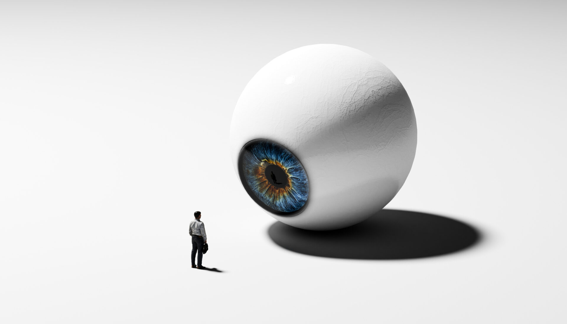 In illustration featuring a large eye of computerized surveillance in the form similar to webcam watches a the tiny figure of a worker.