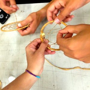 Bishop Marrocco and the Thomas Merton boys soccer team make dream catchers on National Aboriginal Day, June 21, 2016.